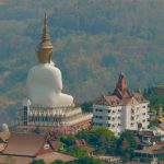 Wat Phra That Sorn Kaew statue from behind
